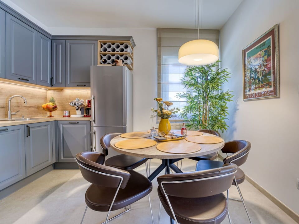 Property, Furniture, Cabinetry, Table, Chair, Interior Design, Wood, Lighting, Countertop, Architecture