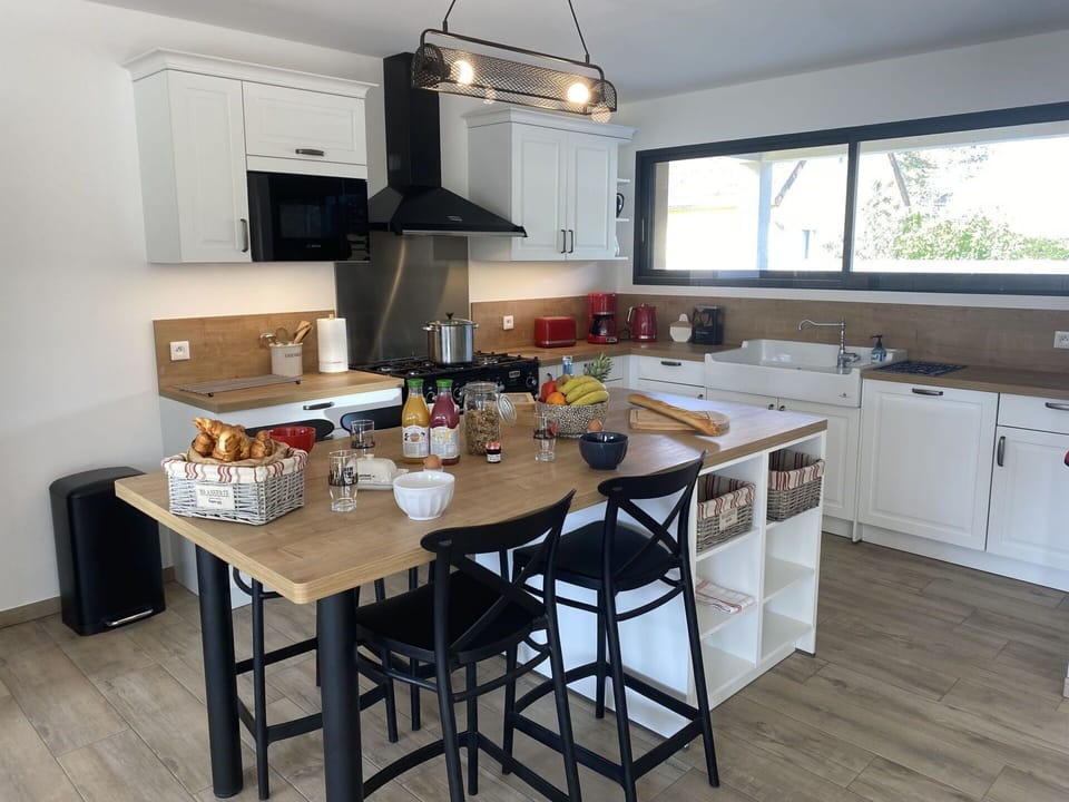 Furniture, Kitchen, Countertop, Kitchen Appliance, Interior Design, Flooring, Wood, Cabinetry, Floor, Chair