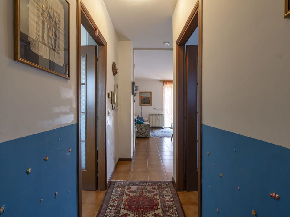 Door, Interior Design, Picture Frame, Wood, Floor, Flooring, Hall, Real Estate, Ceiling