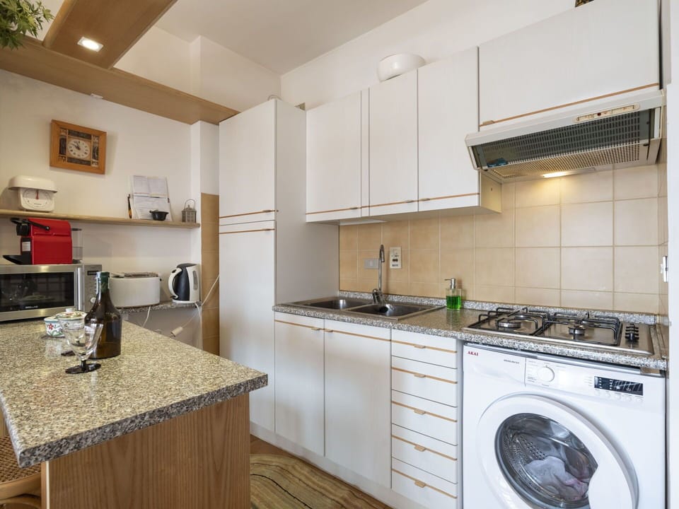 Cabinetry, Property, Laundry Room, White, Clothes Dryer, Home Appliance, Countertop, Washing Machine, Kitchen Appliance, Kitchen
