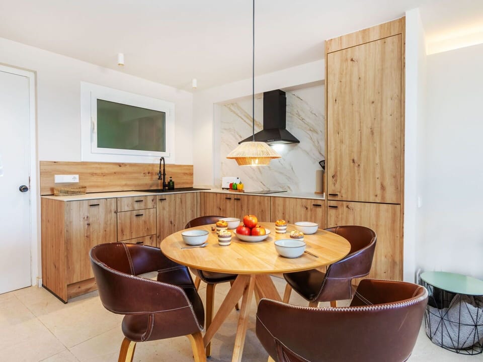 Furniture, Interior Design, Flooring, Wood, Floor, Ceiling, Light Fixture, Table, Chair, Kitchen & Dining Room Table