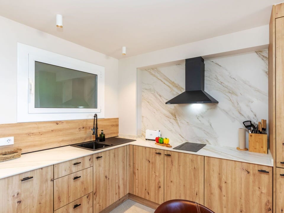 Wood, Countertop, Kitchen, Interior Design, Cabinetry, Flooring, Furniture, Light Fixture, Lighting, Ceiling