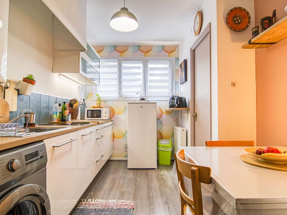 Furniture, Cabinetry, Kitchen Sink, Countertop, Wood, Lighting, Kitchen, Interior Design, Orange, Kitchen Appliance