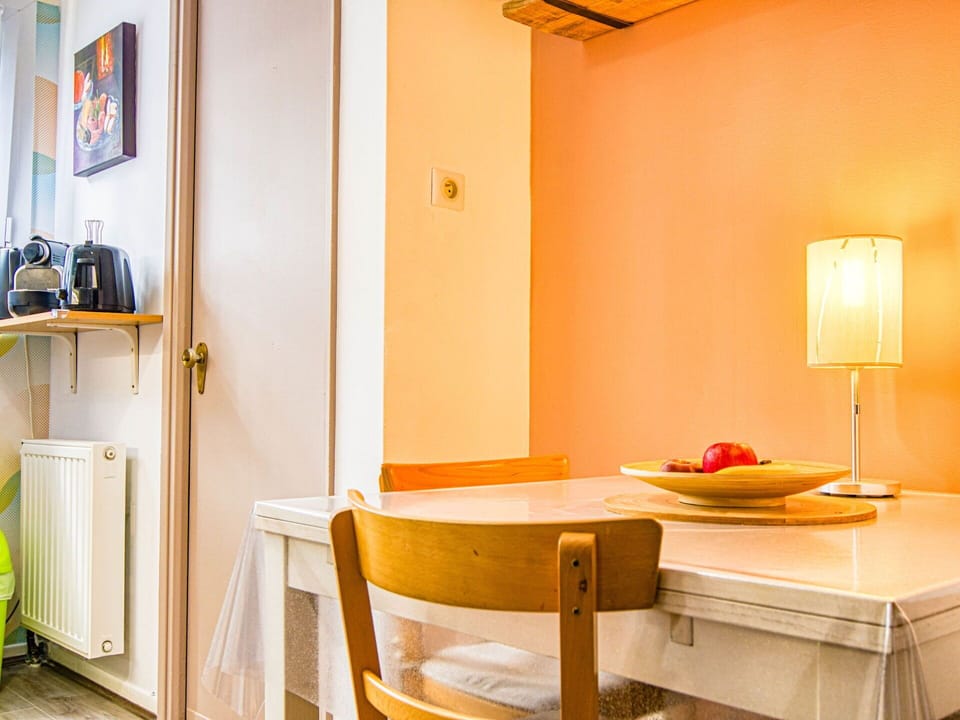 Property, Furniture, Table, Building, Orange, Picture Frame, Interior Design, Wood, Yellow, Floor