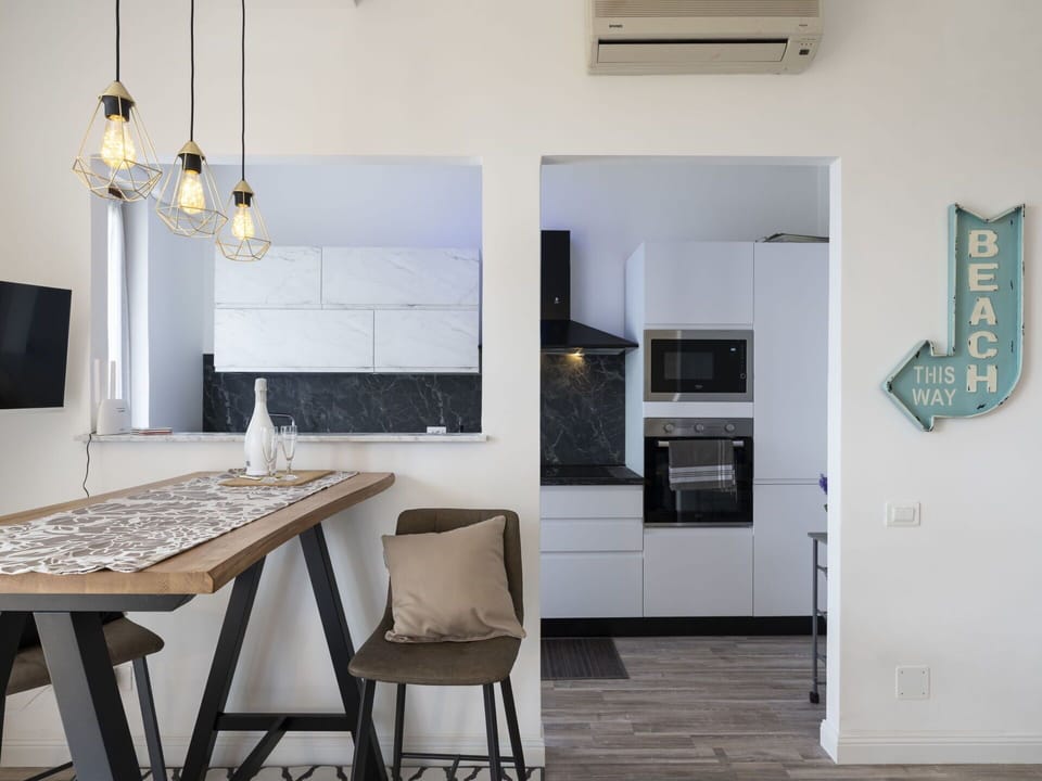 Furniture, Cabinetry, Table, Countertop, Wood, Kitchen, Interior Design, Flooring, Floor, Material Property