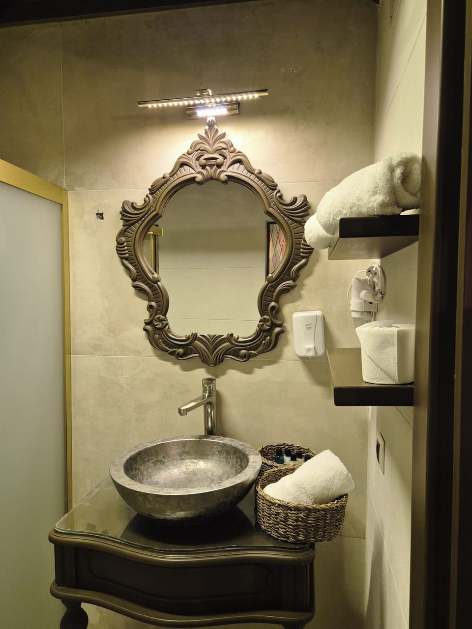 Shower, hair dryer, slippers, towels