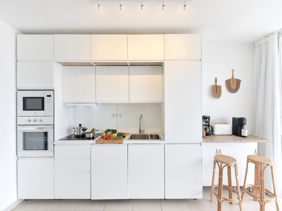Cabinetry, Countertop, Building, Kitchen, Wood, Kitchen Stove, Houseplant, Home Appliance, Kitchen Appliance