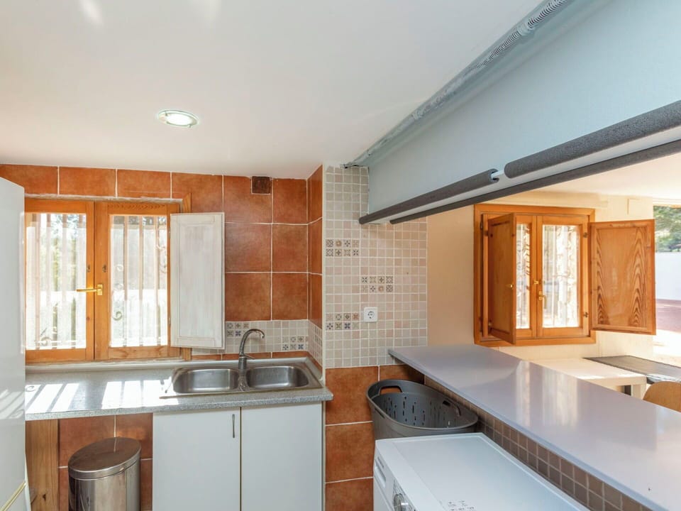 Kitchen, Countertop, Kitchen Sink, Wood, Sink, Major Appliance, Plumbing Fixture, Ceiling, Interior Design, Flooring