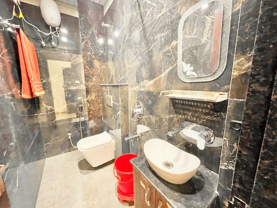 Shower, rainfall showerhead, towels, soap