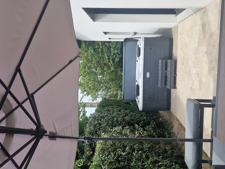 Shade, Chair, Outdoor Structure, Balcony, Courtyard, Backyard, Umbrella, Outdoor Furniture, Daylighting, Houseplant