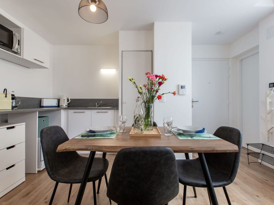 Furniture, Table, Property, Cabinetry, Plant, Chair, Building, Wood, Lighting, Flower