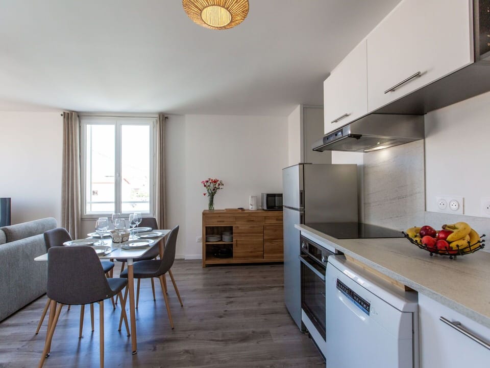 Cabinetry, Furniture, Property, Countertop, Kitchen Appliance, Couch, Kitchen Stove, Kitchen, Interior Design, Wood