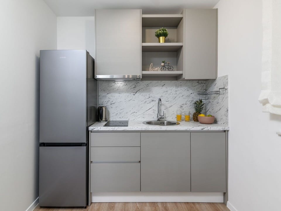 Cabinetry, Sink, Countertop, Building, Tap, Kitchen, Kitchen Sink, Kitchen Stove, Wood, Interior Design