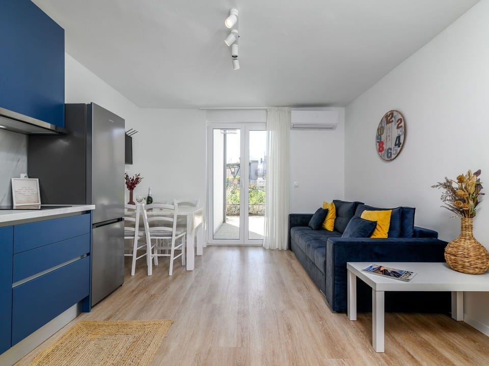 Furniture, Cabinetry, Couch, Blue, Wood, Interior Design, Architecture, Flooring, Floor