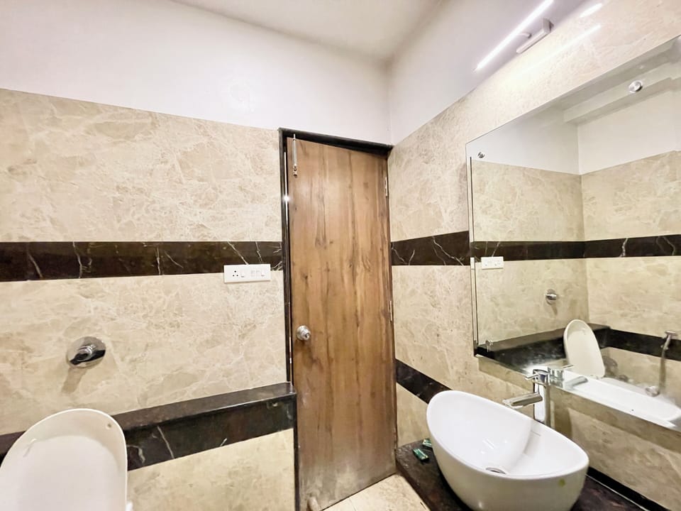Shower, rainfall showerhead, towels, soap