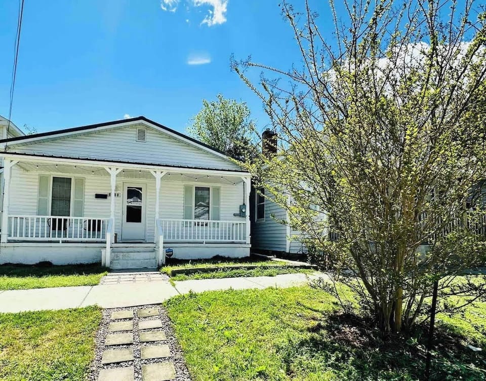 Welcome Home! This Charming Cottage with a Sunny Porch is Calling Your Name!