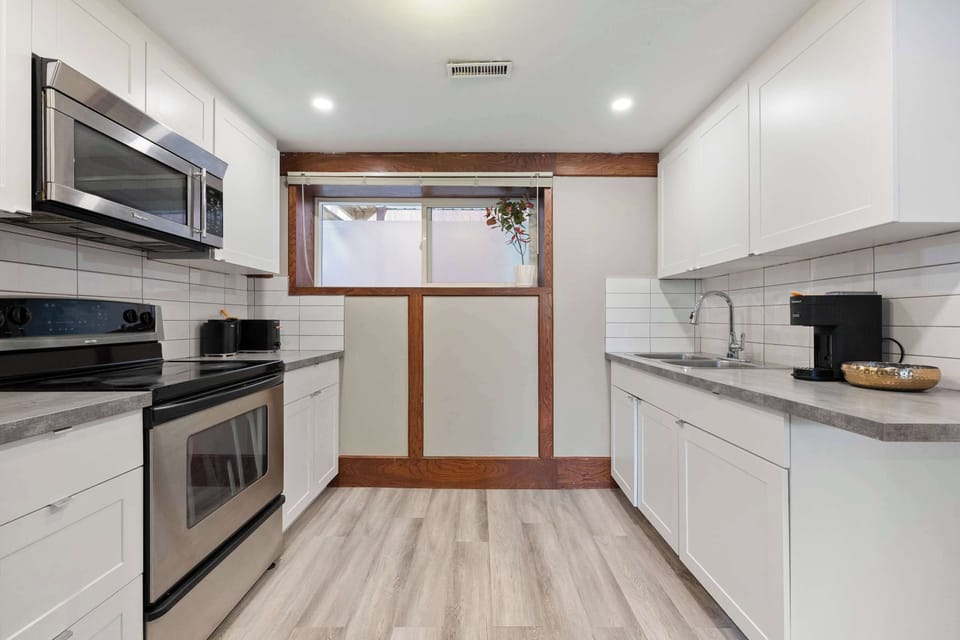 Fully equipped kitchen with cooking essentials.