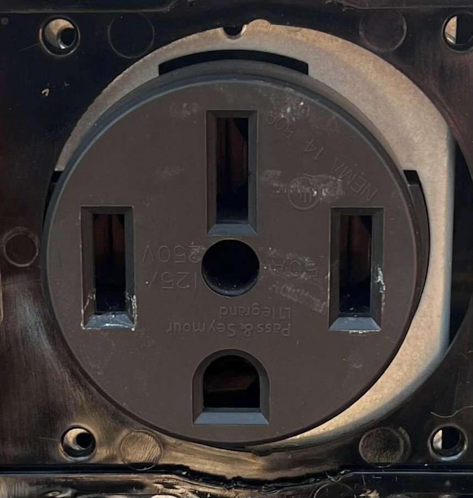 EV Charging Outlet on front of cabin.  Don't forget to bring your cables/adaptors as they are not provided.