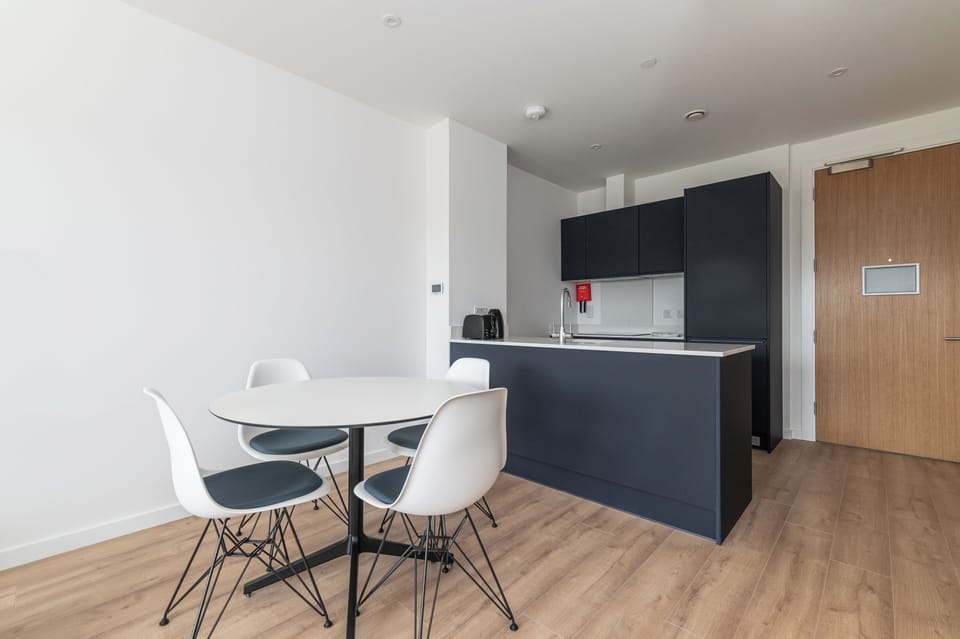 Deluxe Apartment, Balcony | Living area | TV