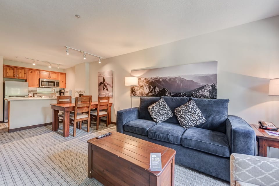 Open living area with plenty of seating, perfect for relaxing or entertaining.