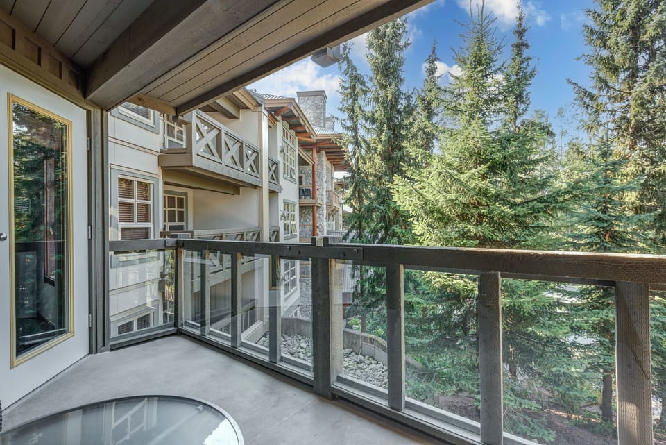 Private balcony with forest views, a perfect spot to enjoy the fresh air.