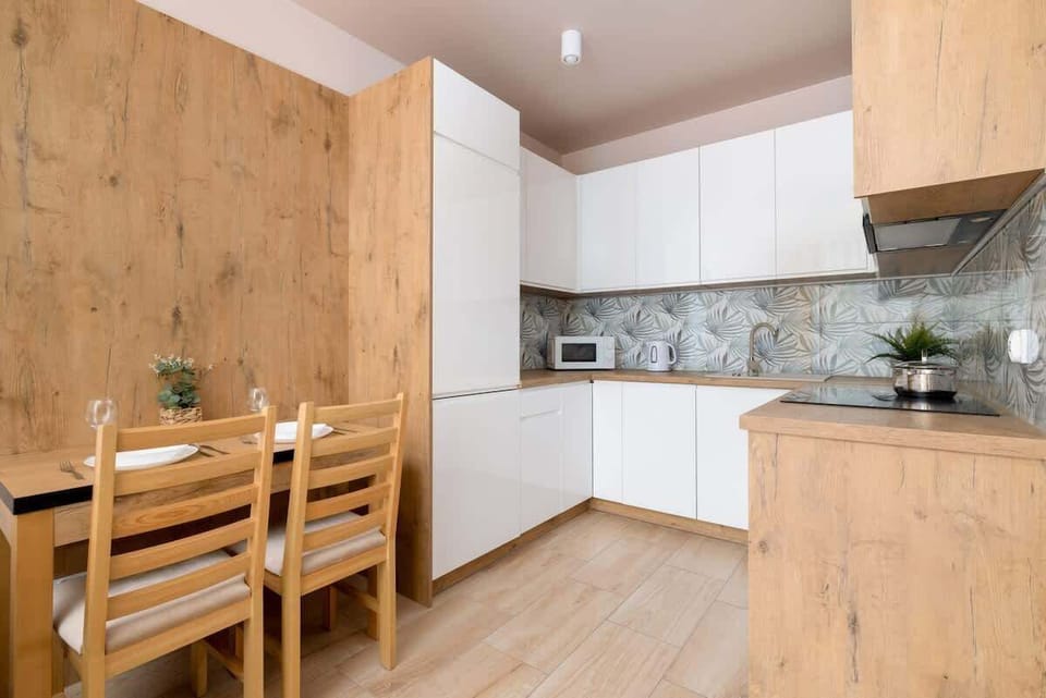 The kitchenette's practical layout maximizes space and functionality.