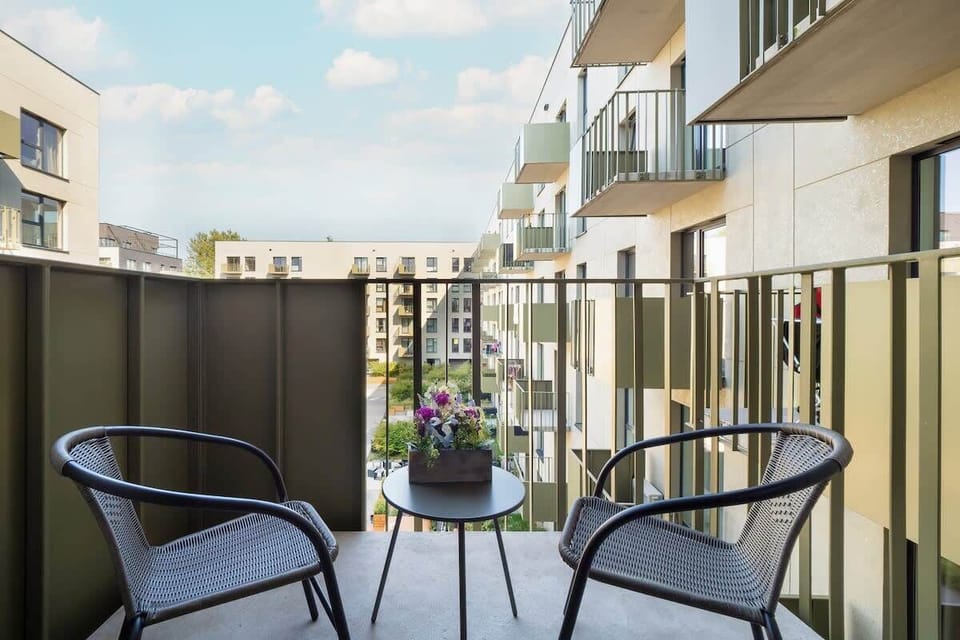 Balcony with garden furniture.