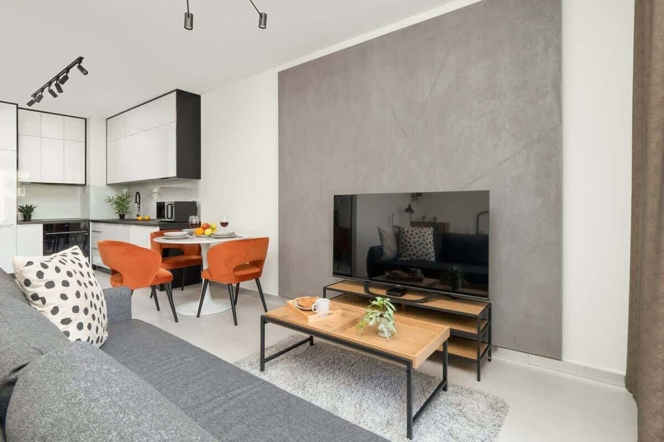 Living area with desk for remote work.