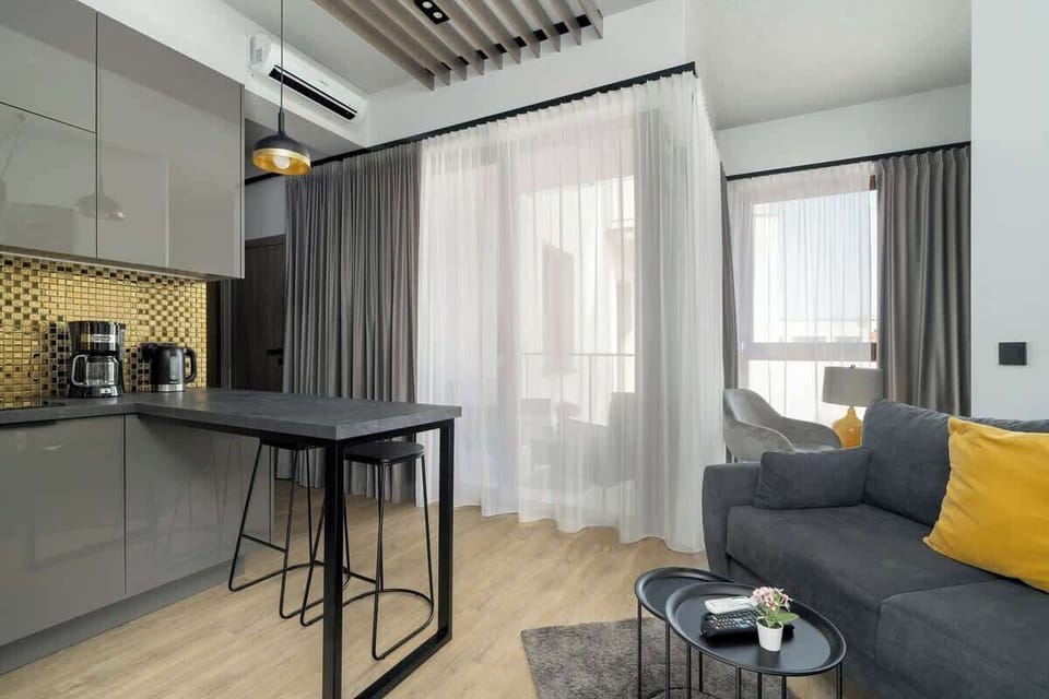 Fully equipped kitchenette with a dining space.
