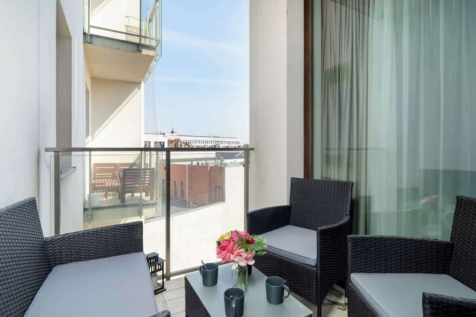 Cozy, furnished balcony.