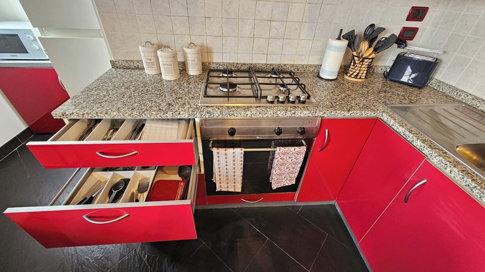 Apartment | Private kitchen | Full-size fridge, microwave, oven, stovetop