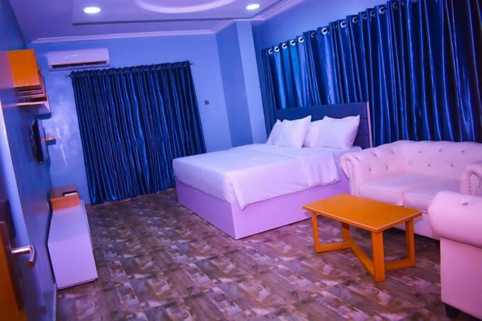 Family Room, Balcony, City View | Desk, laptop workspace, free WiFi
