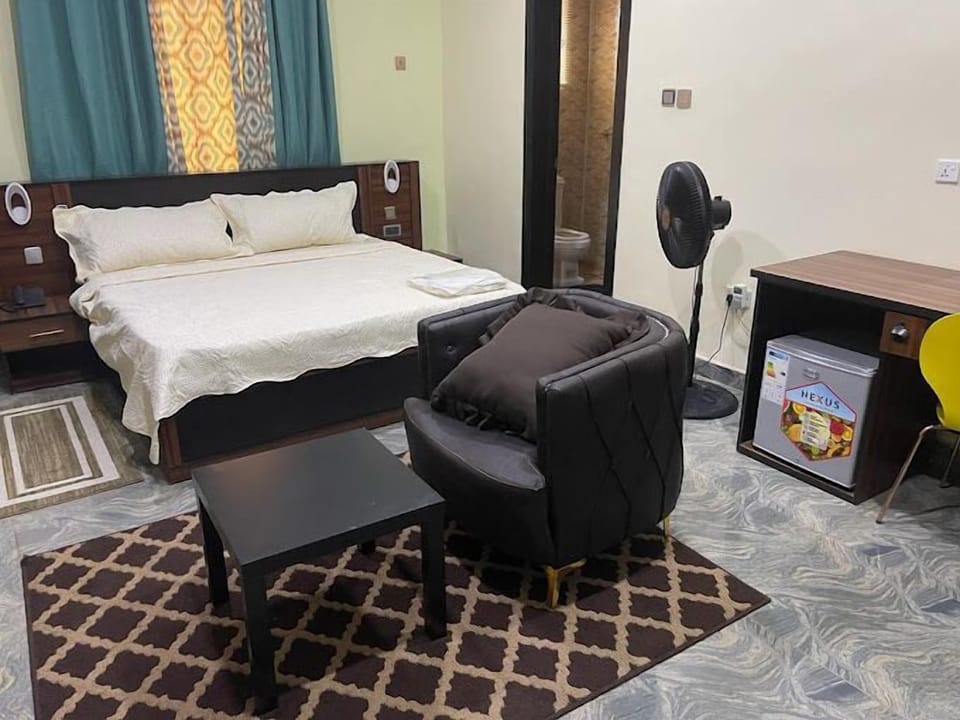 Comfort Room, Balcony, City View | Desk, laptop workspace, free WiFi
