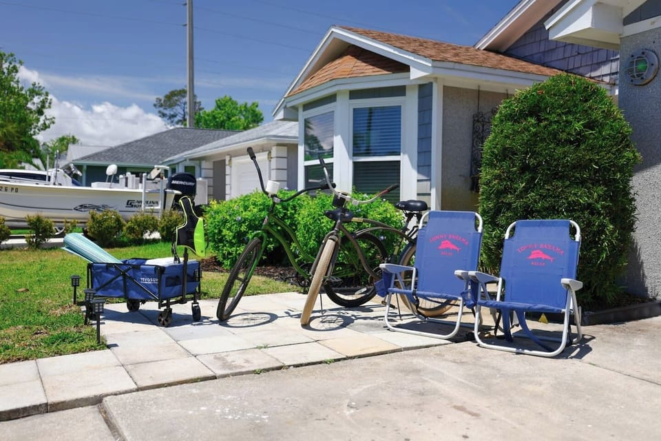 Beach chairs and a utility wagon are available for use.