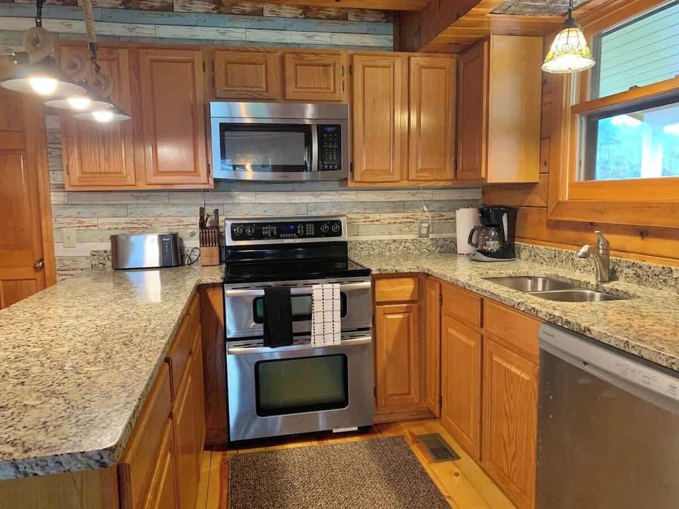A 6 piece fully appointed kitchen is provided. Electric range and oven, microwave, huge fridge with freezer, handy water and ice dispenser in the door, and of course a dishwasher and granite counter tops.