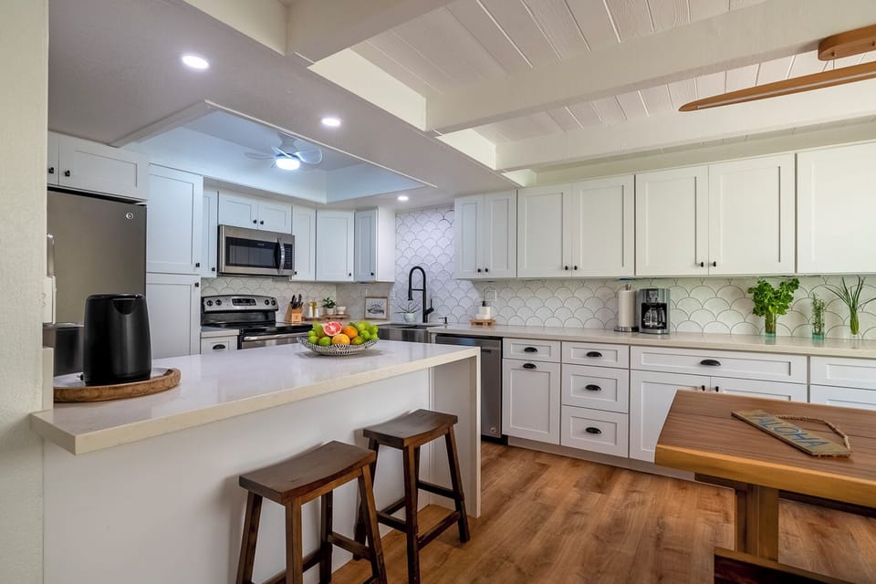 Condo, Multiple Beds, Patio, Garden View ( 2C) | Private kitchen | Coffee/tea maker