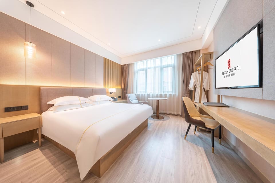 Premium bedding, down comforters, desk, laptop workspace