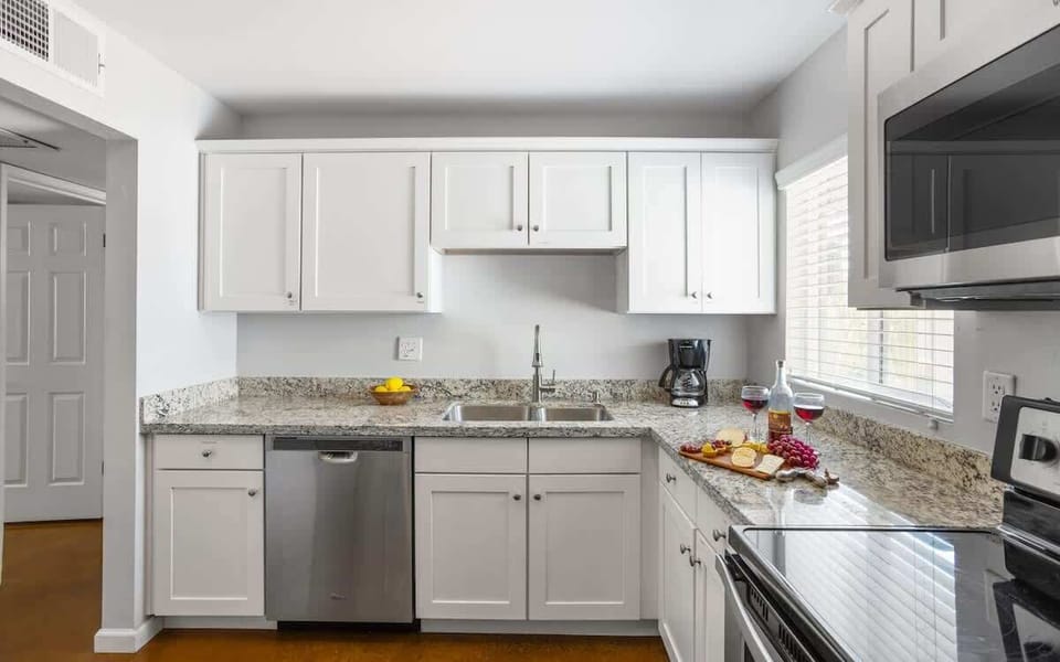 Spacious kitchen with stainless steel appliances and plenty of counter space.