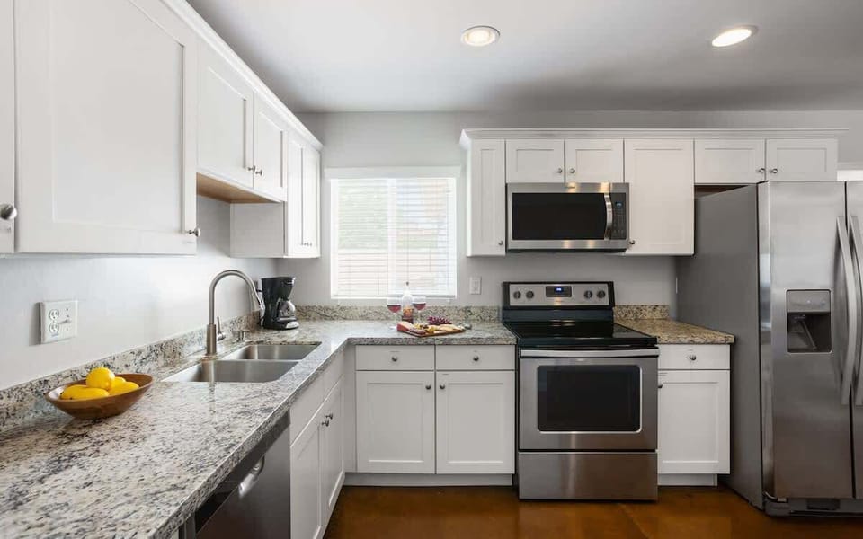 Spacious kitchen with stainless steel appliances and plenty of counter space.