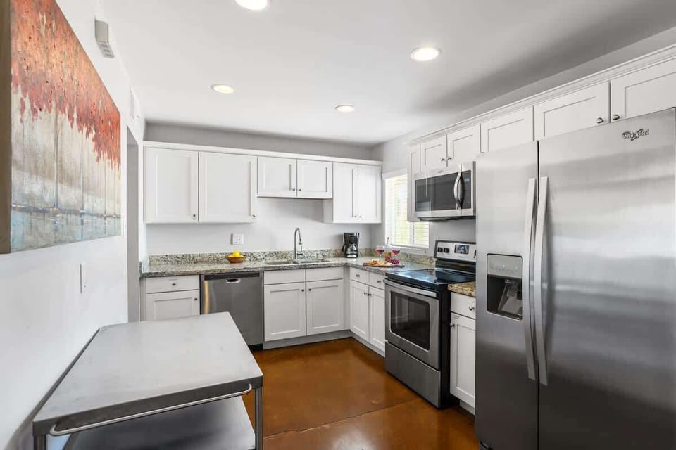 Spacious kitchen with stainless steel appliances and plenty of counter space.