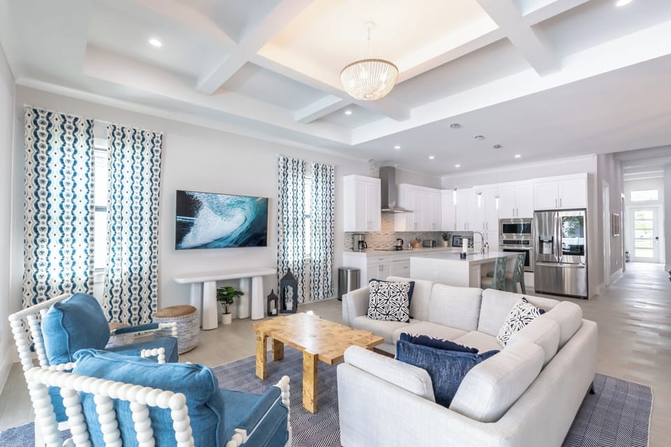 Welcome to Seaside Sanctuary! This spacious home sleeps up to 12 guests. Enjoy beach days, relax by the private heated pool, and make unforgettable memories! | Seaside Sanctuary, Naples, Florida | Voyax Luxury Vacation Rentals