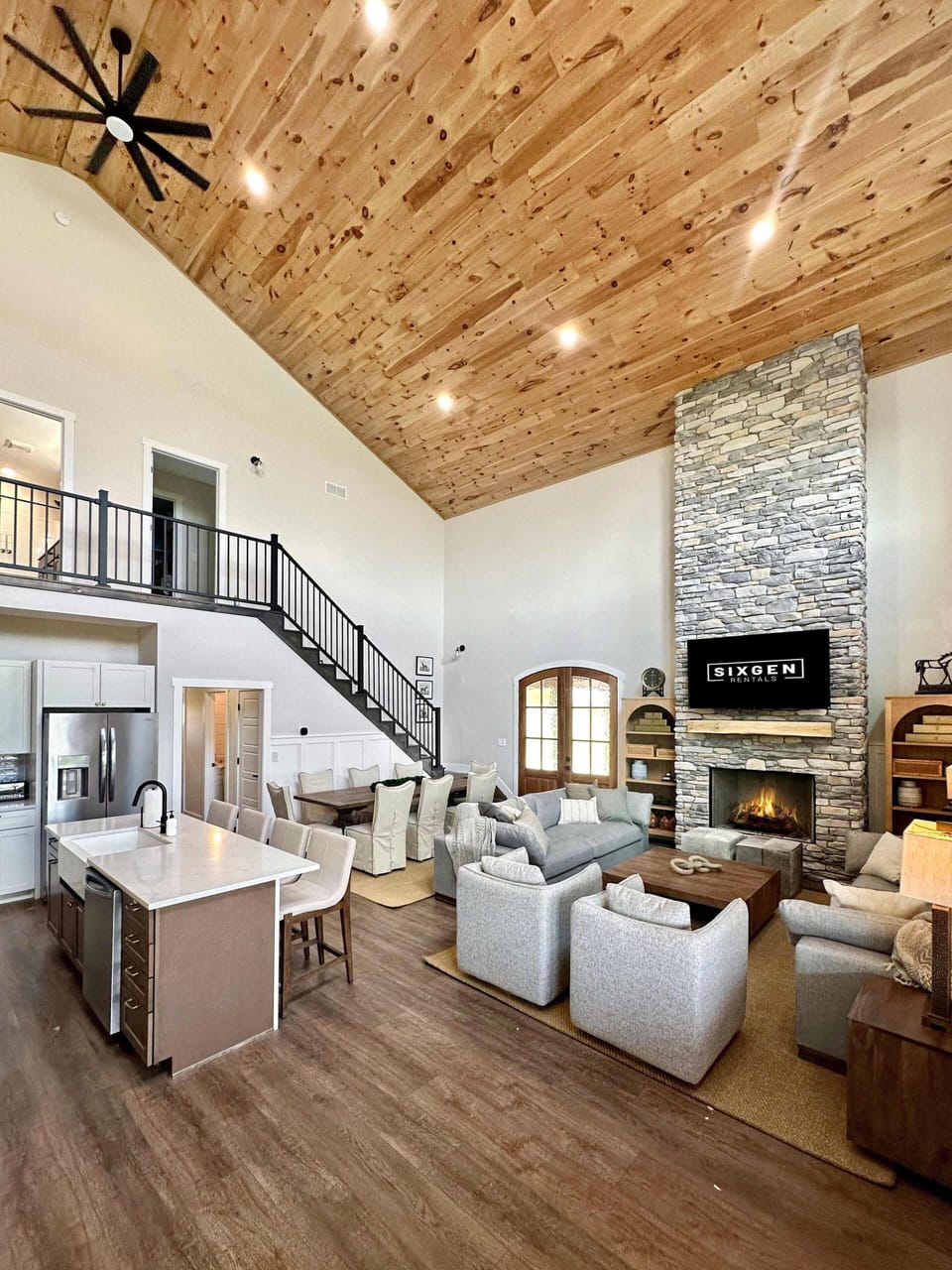 Spacious open-concept first floor seamlessly blends kitchen, living, and dining areas, creating the perfect setting for entertaining and making memories. Enjoy modern amenities, cozy seating, and plenty of room to gather with friends and family.