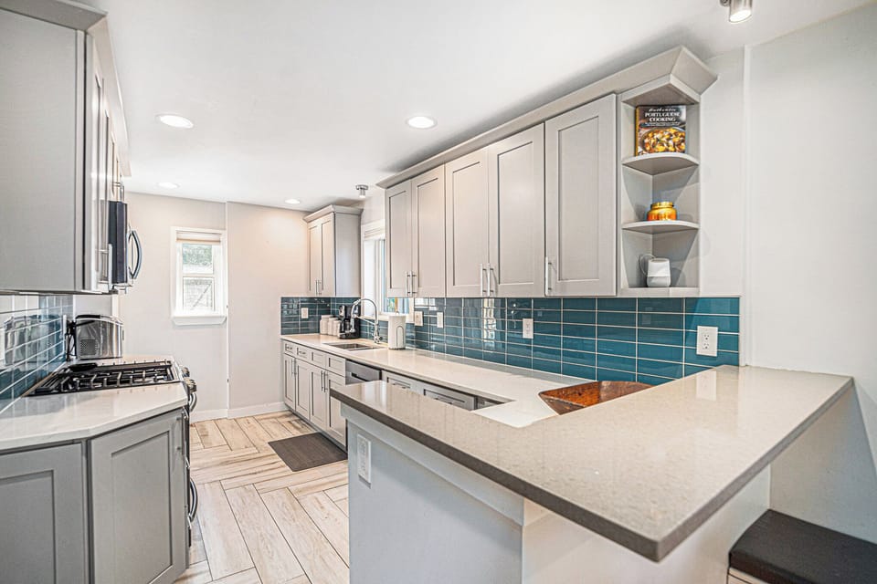 Bright and airy kitchen with everything you need to cook at home.