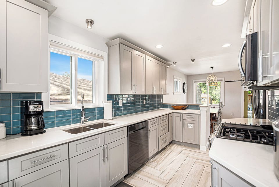 Bright and airy kitchen with everything you need to cook at home.
