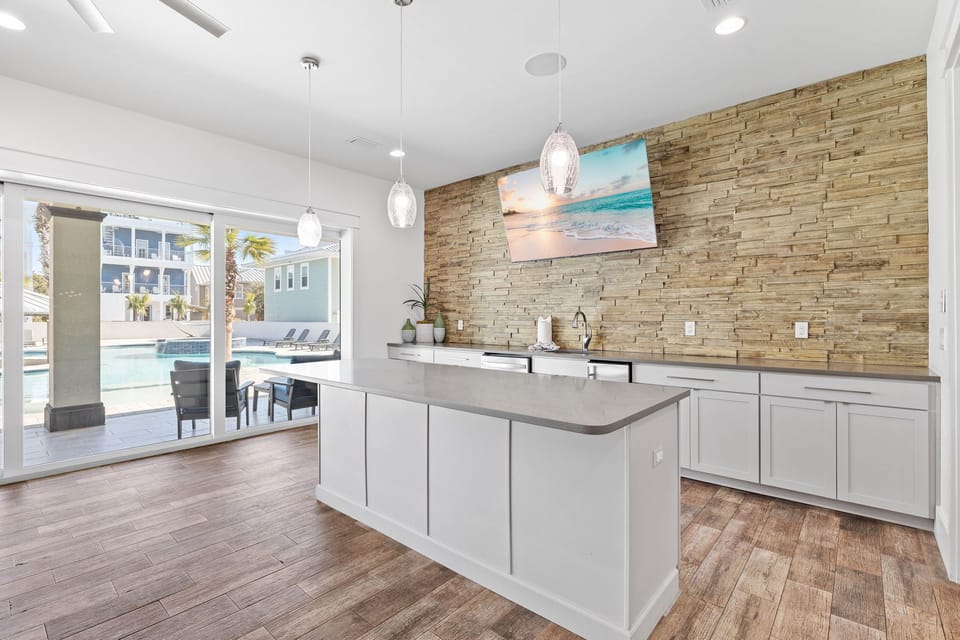 The 1st floor kitchenette includes an ice maker, sink, and an extra dishwasher.