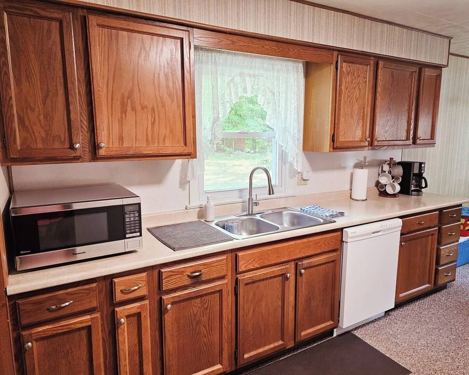 KITCHEN:  Full kitchen with all appliances including a dishwasher.
