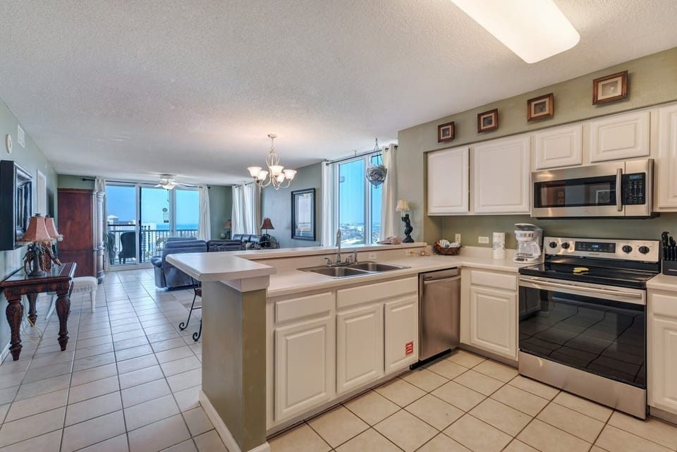 Condo, 3 Bedrooms | Private kitchen | Coffee/tea maker, fridge, toaster, cookware/dishes/utensils