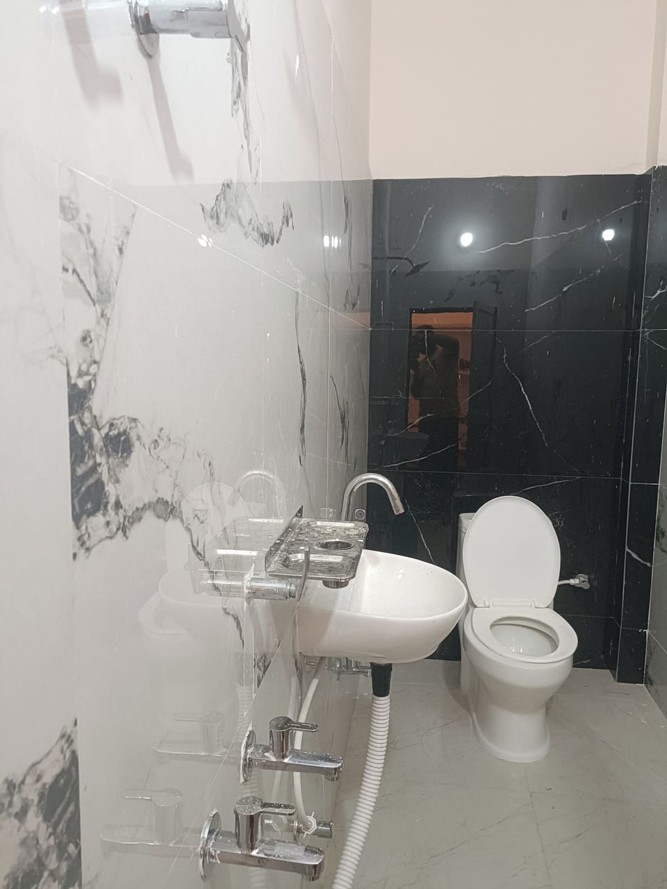 Deluxe Double Room, City View | Bathroom | Free toiletries, slippers, towels, soap