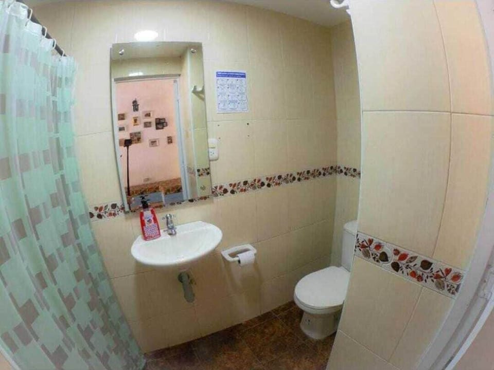 Shower, towels, soap, toilet paper
