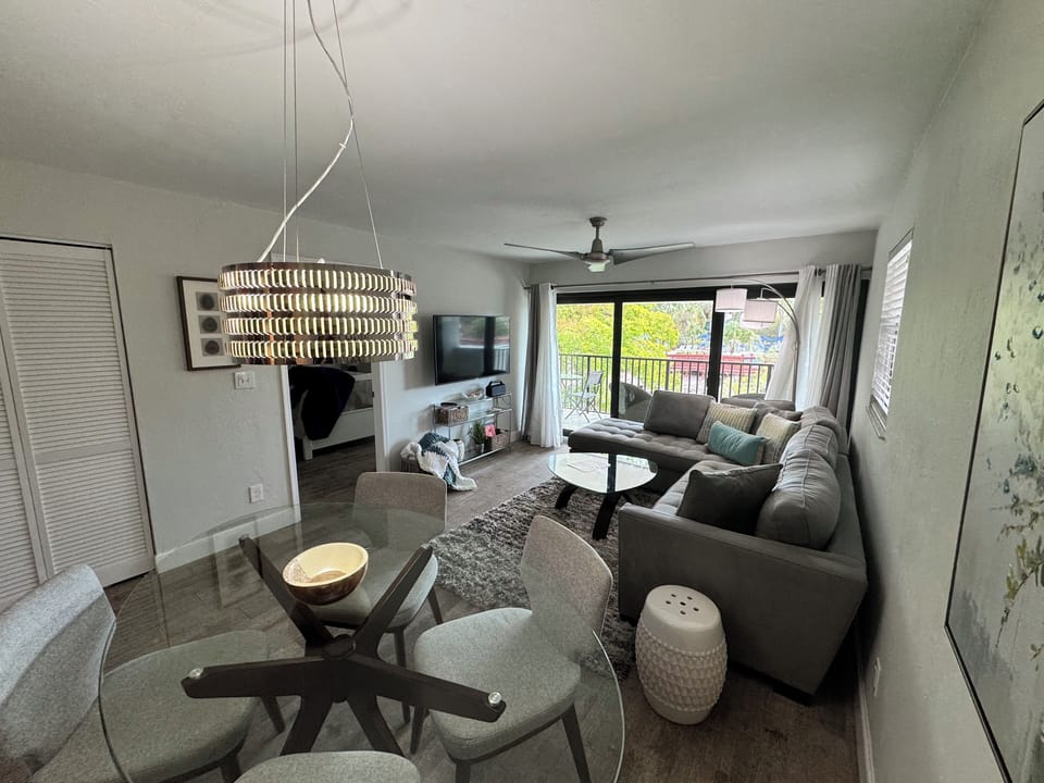 Living Area, 55 inch smart TV, Cable TV,  WIFI and comfortable seating.